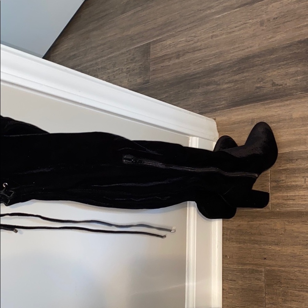 Thigh high heeled boots